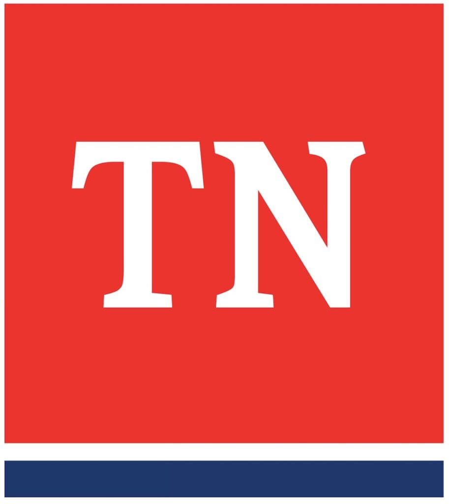 The image displays a logo with a large, bold "tn" centered on a red background with a blue stripe at the bottom.